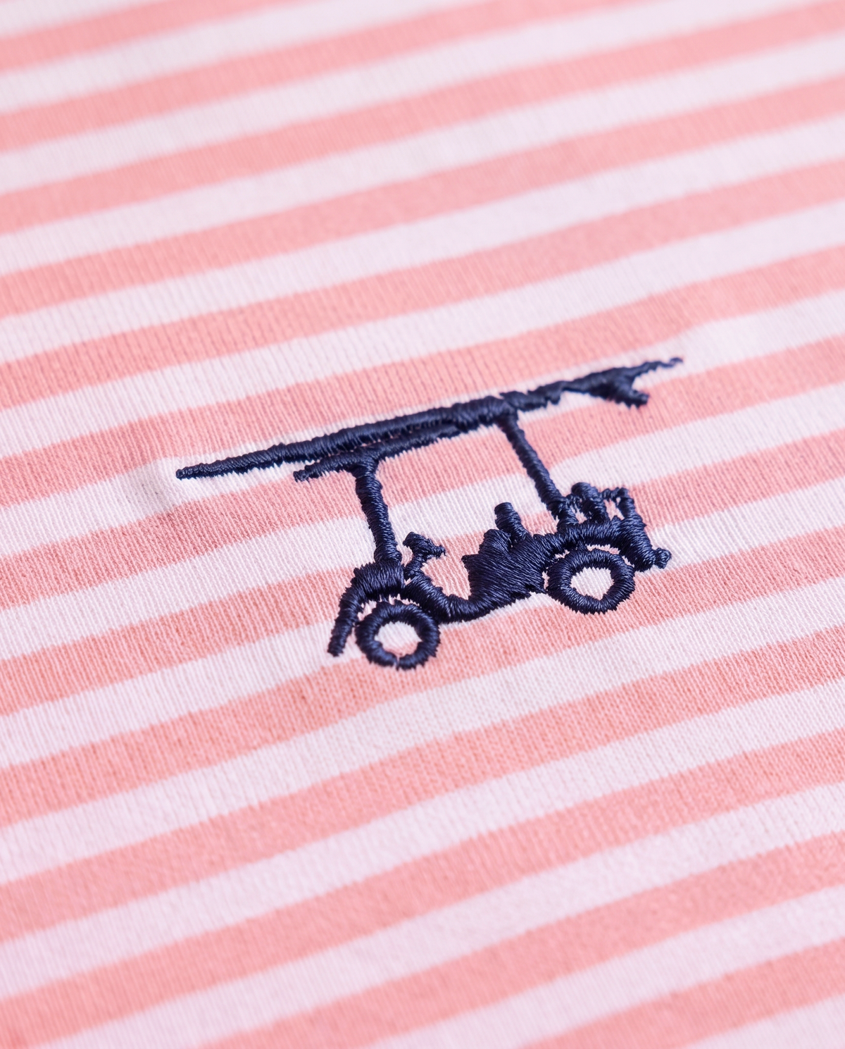 Albatross Polo Blush/White Feeder Stripe logo detail